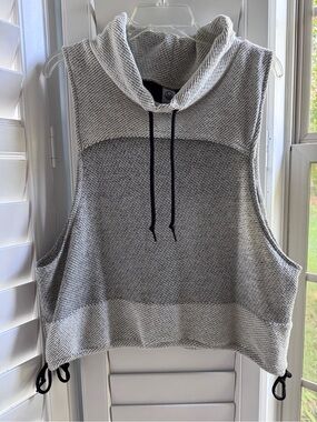 Te Verde knit vest with wide arm holes. Large